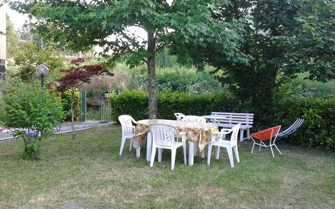 Appartamento Porretta Terme: Ejendom, Gård, Bord, Hus, Backyard, Have, Græs, Sommerhus, Træ, Ejendom