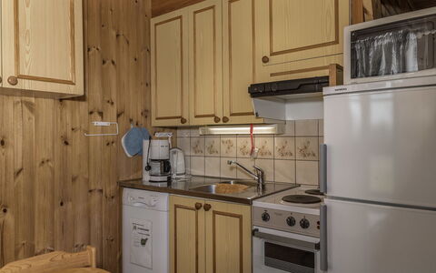 Ylläskarpalo 1 Päätyhuoneisto: Køkken, Træ, Countertop, Cabinetry, Gulvbelægning, Loft, Etage, Større Bandage, Køkken Apparat, Indretning