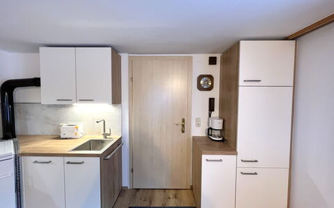 Wallner: Countertop, Træ, Gulvbelægning, Køkken, Indretning, Møbel, Håndvask, Cabinetry, Etage, Sanitærarmatur