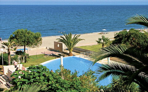Moriani-Plage 623: Vand, Himmel, Ejendom, Plante, Bygning, Lys, Azure, Natur, Træ, Badeby