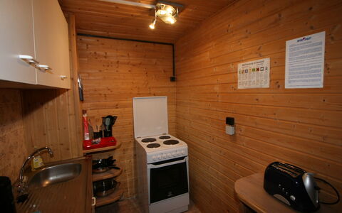 Schöser: Ejendom, Køkken Apparat, Træ, Cabinetry, Husholdningsapparat, Etage, Gulvbelægning, Countertop, Komfur, Komfur