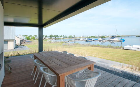 Oesterdam Resort: Vand, Ejendom, Himmel, Bord, Skygge, Udendørs Møbler, Træ, Stol, Båd, Udendørs Bord