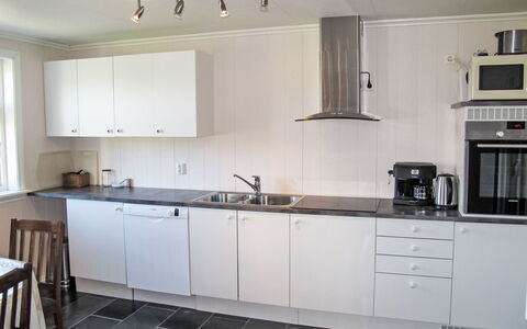 Galanten: Køkken, Countertop, Køkken Apparat, Gulvbelægning, Træ, Større Bandage, Cabinetry, Køkkenvask, Indretning, Etage