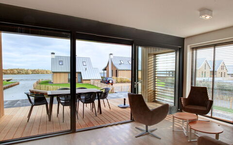 Oesterdam Resort: Indretning, Værelse, Ejendom, Bygning, Møbel, Stue, Hus, Arkitektur, Ejendom, Hjem