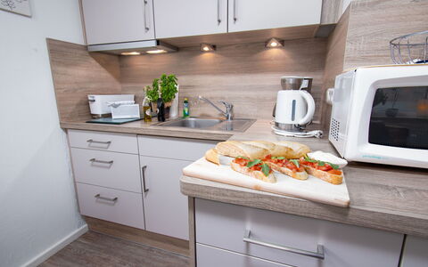 Sanddüne: Cabinetry, Countertop, Ejendom, Møbel, Bygning, Køkken, Køkken Apparat, Træ, Tap, Indretning