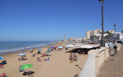 Apartamento Caracola: Vand, Himmel, Strand, Gadebelysning, Cykel, Skygge, Sand, Horisont