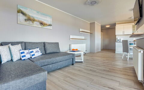 Resorts Kołobrzeg: Couch, Træ, Komfort, Indretning, Etage, Gulvbelægning, Studio Couch, Stue, Rektangel