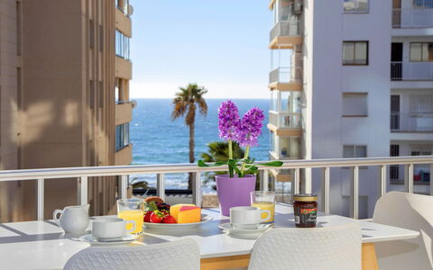 Costa Blanca Ii: Bord, Bygning, Himmel, Møbel, Ejendom, Vindue, Blomsterkrukke, Blomst, Vand, Plante