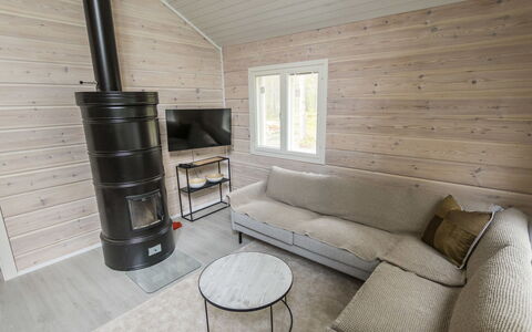 Villa Galdu a: Træ, Hårdttræ, Bjælkehytte, Planke, Bejdse, Trægulve, Stue, Vinter, Sidespor