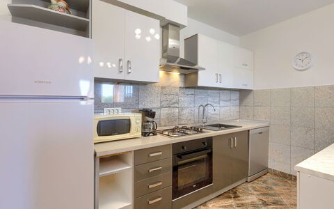 Goga: Countertop, Cabinetry, Bygning, Tap, Håndvask, Møbel, Køkken, Køkkenvask, Komfur, Skuffe