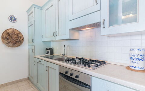 Maddy: Cabinetry, Ejendom, Countertop, Komfur, Gaskomfur, Køkken Apparat, Køkkenvask, Cooktop, Køkken, Komfur