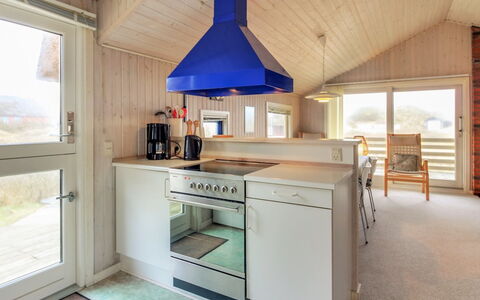 Telia - 250M from the Sea: Træ, Loft, Køkken, Indretning, Gulvbelægning, Lysarmatur, Møbel, Værelse, Etage, Countertop