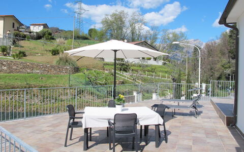 Casa di Giò: Plante, Sky, Himmel, Møbel, Ejendom, Bord, Bygning, Paraply, Skygge, Udendørs Møbler