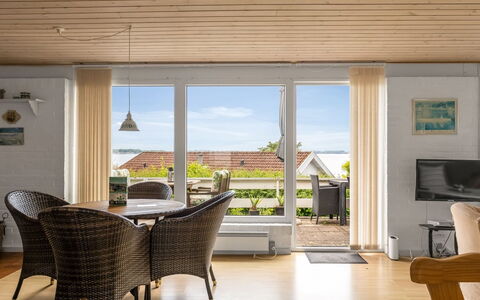 Tekla - 70M to the Fjord: Møbel, Træ, Gulvbelægning, Etage, Indretning, Loft, Stol, Bord, Hjem, Trægulve