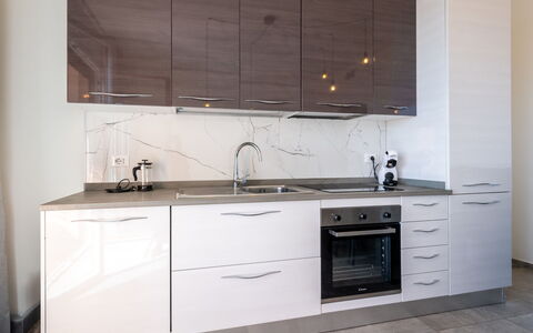 Casa Clio: Cabinetry, Countertop, Køkken, Gulvbelægning, Møbel, Træ, Køkken Apparat, Skuffe, Indretning, Hjem