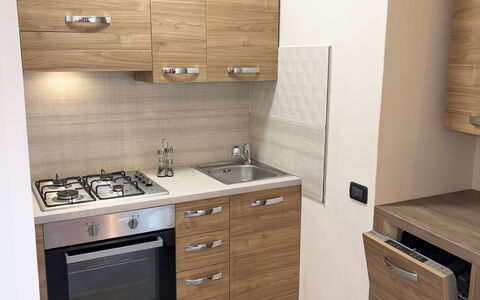 Apartment Tre - Diano Marina: Cabinetry, Møbel, Ejendom, Bygning, Håndvask, Countertop, Skuffe, Tap, Træ, Kommode