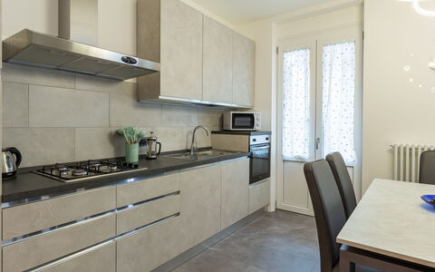 Livia: Cabinetry, Møbel, Countertop, Køkkenvask, Bygning, Bord, Tap, Komfur, Håndvask, Køkken Apparat