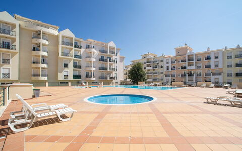 Sunny Beach Casa-M: Bygning, Himmel, Ejendom, Vand, Vindue, Azure, Urban Design, Plante, Ejerlejlighed, Højhus