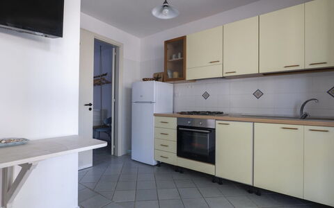 Torre Vado 653: Cabinetry, Ejendom, Countertop, Møbel, Bygning, Komfur, Skuffe, Træ, Indretning, Køkken