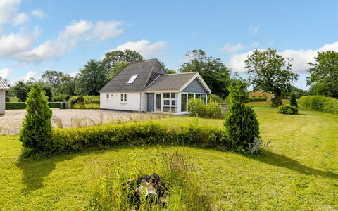 Thrine - 24Km from the Sea: Møbel, Indretning, Gulvbelægning, Etage, Loft, Værelse, Stol, Bord, Lejlighed, Køkken & Spisebord