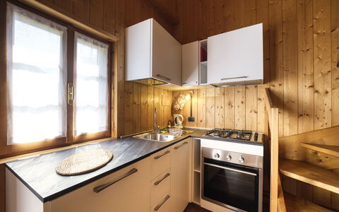Incanto Walser Apartments Testa: Countertop, Cabinetry, Ejendom, Bygning, Møbel, Vindue, Håndvask, Køkken, Skuffe, Træ