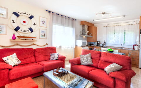 Fane de Baix i: Couch, Ejendom, Møbel, Bord, Stue, Indretning, Studio Couch, Belysning, Orange, Pude