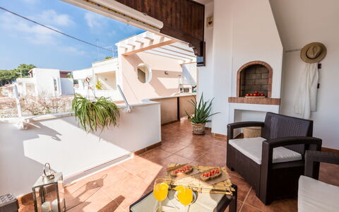 Appartamento Lido Specchiolla: Hjem, Lejlighed, Blomsterkrukke, Stueplante, Altan, Stol, Skygge, Bejdse, Penthouselejlighed