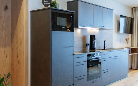 Grossarl 71: Møbel, Gulvbelægning, Indretning, Cabinetry, Etage, Træ, Trægulve, Køkken, Countertop, Loft