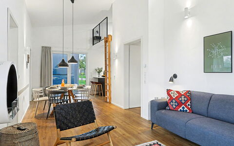 Dünenblick: Møbel, Indretning, Gulvbelægning, Væg, Etage, Couch, Træ, Stue, Loft, Stol