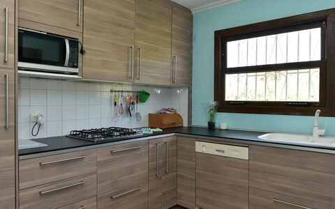 Toscal: Countertop, Cabinetry, Værelse, Ejendom, Køkken, Møbel, Indretning, Grøn, Bygning, Flise