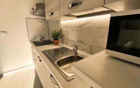 Posada 10: Countertop, Køkken, Køkken Apparat, Gulvbelægning, Træ, Cabinetry, Indretning, Større Bandage, Husholdningsapparat, Etage