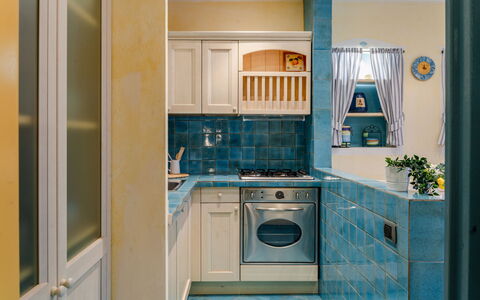 Suite la Torre: Køkken, Countertop, Køkken Apparat, Større Bandage, Indretning, Gulvbelægning, Cabinetry, Etage, Værelse, Husholdningsapparat