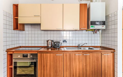La Coccinella: Køkken, Større Bandage, Køkken Apparat, Træ, Countertop, Gulvbelægning, Indretning, Cabinetry, Køkkenvask, Håndvask
