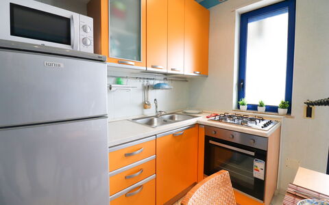 Circe Sea View: Køkken, Køkken Apparat, Større Bandage, Countertop, Træ, Køkkenvask, Komfur, Cabinetry, Komfur, Indretning