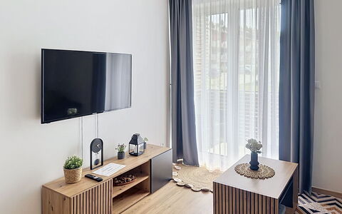 Korzo: Møbel, Indretning, Væg, Gulvbelægning, Træ, Etage, Værelse, Hjem, Belysning, Stue