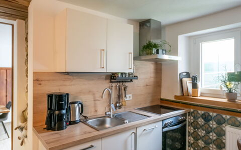 Messern: Køkken Apparat, Køkken, Countertop, Møbel, Cabinetry, Indretning, Større Bandage, Træ, Gulvbelægning, Husholdningsapparat