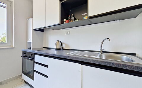 Aurora: Køkken, Countertop, Cabinetry, Køkken Apparat, Større Bandage, Gulvbelægning, Indretning, Træ, Køkkenvask, Hjem