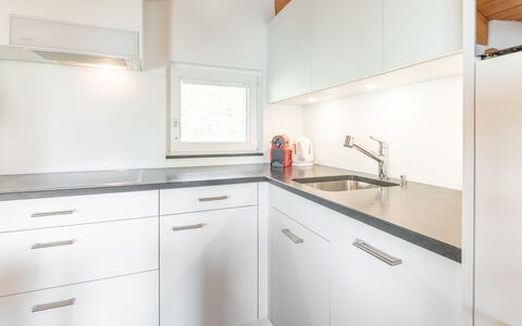 Darschalè 11: Køkken, Countertop, Indretning, Gulvbelægning, Træ, Cabinetry, Loft, Etage, Hjem, Køkkenvask