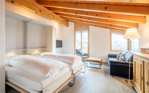 Darschalè 11: Soveværelse, Lejlighed, Seng, Sengetøj, Bed Frame, Hotel, Sengetøj, Sengetøj, Glacial Landskabsform, Udvej