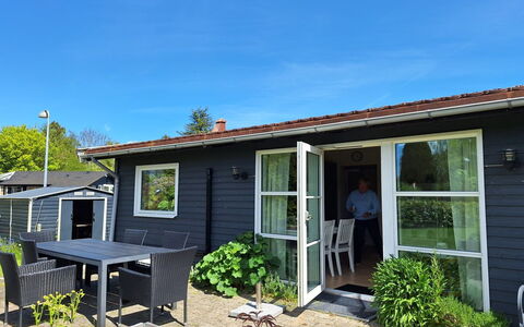 Arise - 1.5Km from the Sea: Dør, Hjem, Hus, Møbel, Sommerhus, Sidespor, Veranda, Stol, Gård, Skygge