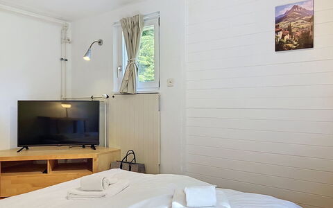 Chalet Chaudoudoux: Træ, Gulvbelægning, Etage, Indretning, Loft, Værelse, Dør, Seng, Soveværelse, Hårdttræ