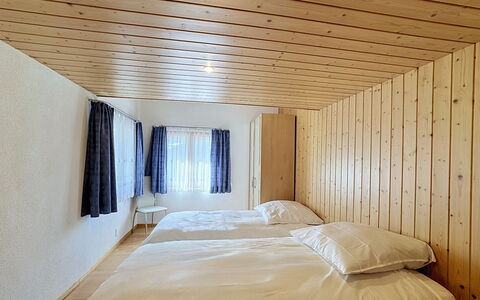 Haus Wasserfall: Væg, Træ, Etage, Gulvbelægning, Loft, Indretning, Soveværelse, Seng, Sengetøj, Værelse