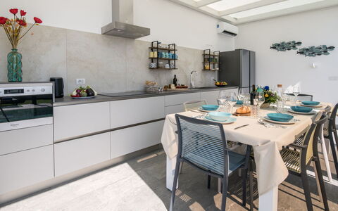 Villa Sabbie Rosse 6: Køkken, Countertop, Møbel, Indretning, Køkken Apparat, Gulvbelægning, Større Bandage, Cabinetry, Hjem, Etage