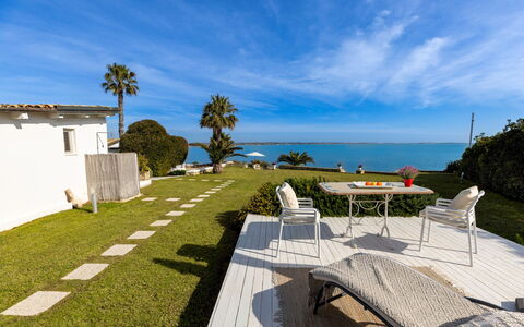Baia L'Aura 8: Blå, Hav, Ocean, Kyst, Coastal Og Oceaniske Landskabsformer, Kyst, Lawn, Skygge, Strand, Tropics