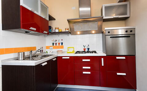 Villa Cristiana: Køkken, Køkken Apparat, Cabinetry, Møbel, Større Bandage, Komfur, Countertop, Træ, Indretning, Komfur
