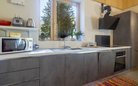 Crestun Design Duplex: Countertop, Køkken, Køkken Apparat, Gulvbelægning, Møbel, Større Bandage, Træ, Indretning, Cabinetry, Husholdningsapparat