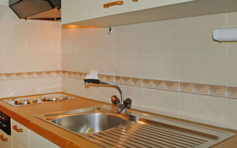 Caslano 100: Tap, Sanitærarmatur, Countertop, Køkkenvask, Cabinetry, Håndvask, Træ, Køkken, Indretning, Komfur