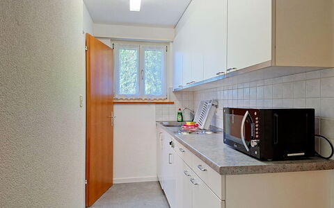 Grindelwald 255: Gulvbelægning, Køkken, Træ, Større Bandage, Køkken Apparat, Countertop, Indretning, Etage, Cabinetry, Værelse