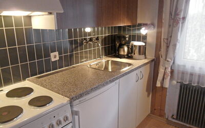 Chalet Bärgsunna 255.3: Countertop, Cabinetry, Køkkenvask, Håndvask, Ejendom, Tap, Komfur, Sanitærarmatur, Køkken, Køkken Apparat