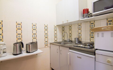 La Toussuire 260: Cabinetry, Bygning, Produkt, Køkken Apparat, Countertop, Gaskomfur, Komfur, Indretning, Cooktop, Komfur